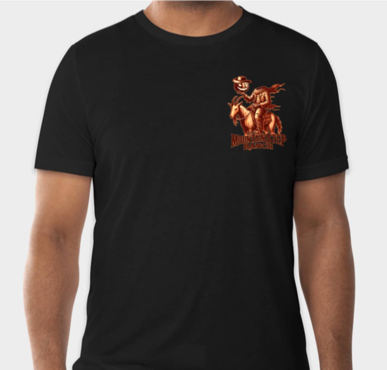Black Mountain Step Ranch Halloween T-shirt with headless rider on a goat